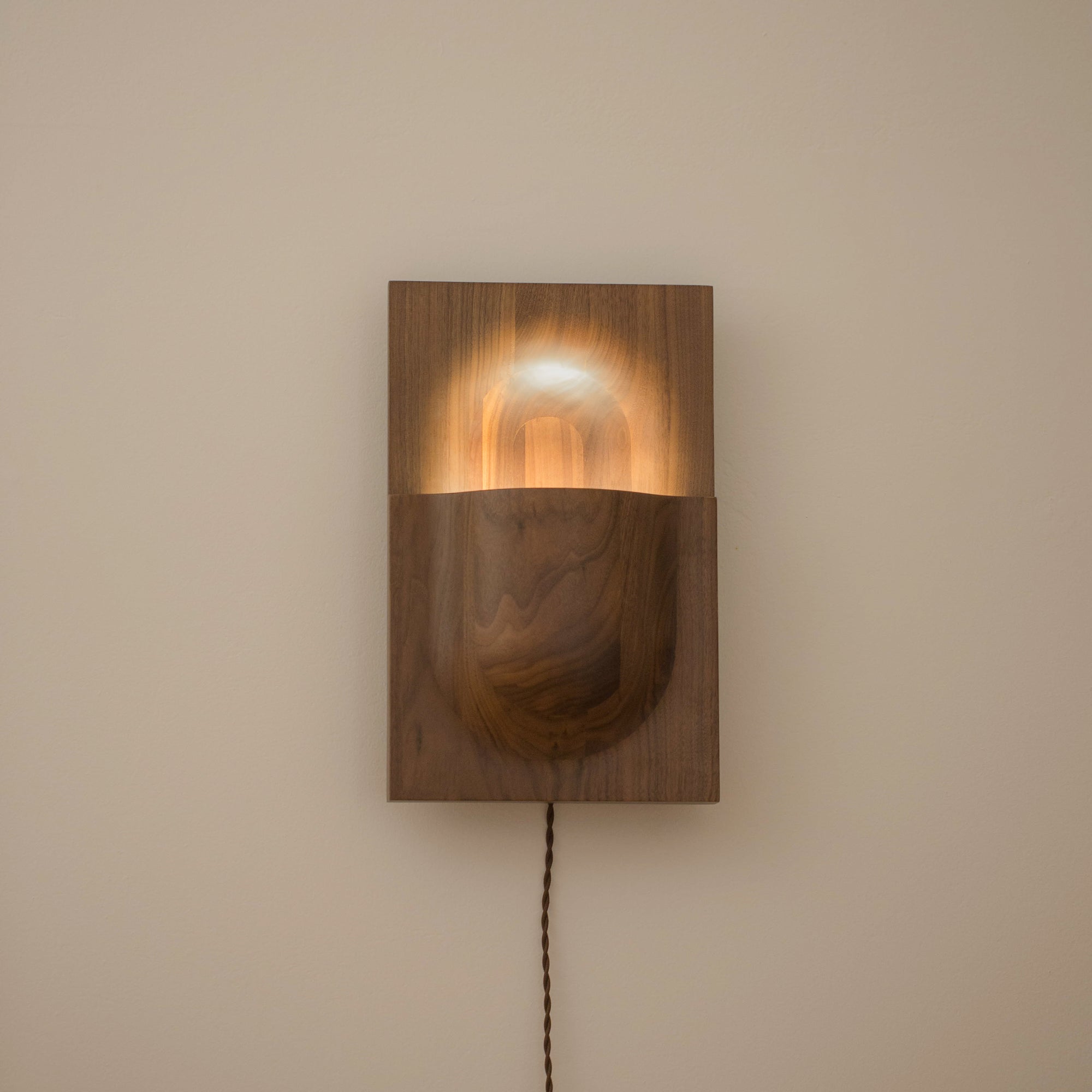 PARCTA Circuit Sconce wall light mounted on a wall with a modern, minimalist design, featuring a sleek metal finish.