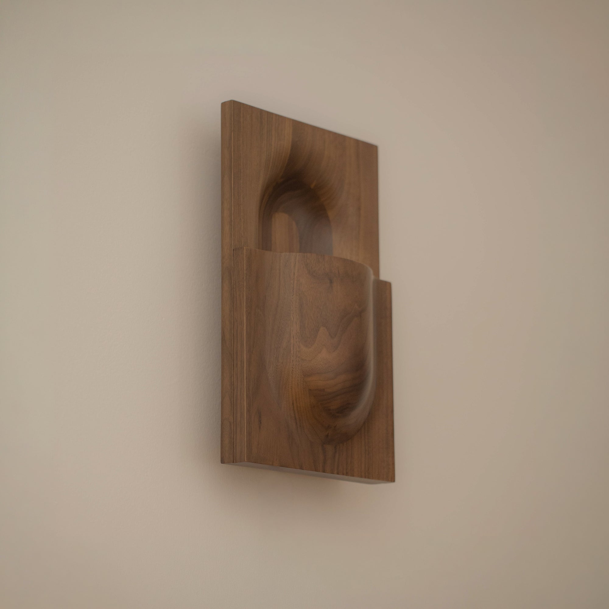 PARCTA Circuit Sconce wall light mounted on a wall with a sleek, modern design and black finish.
