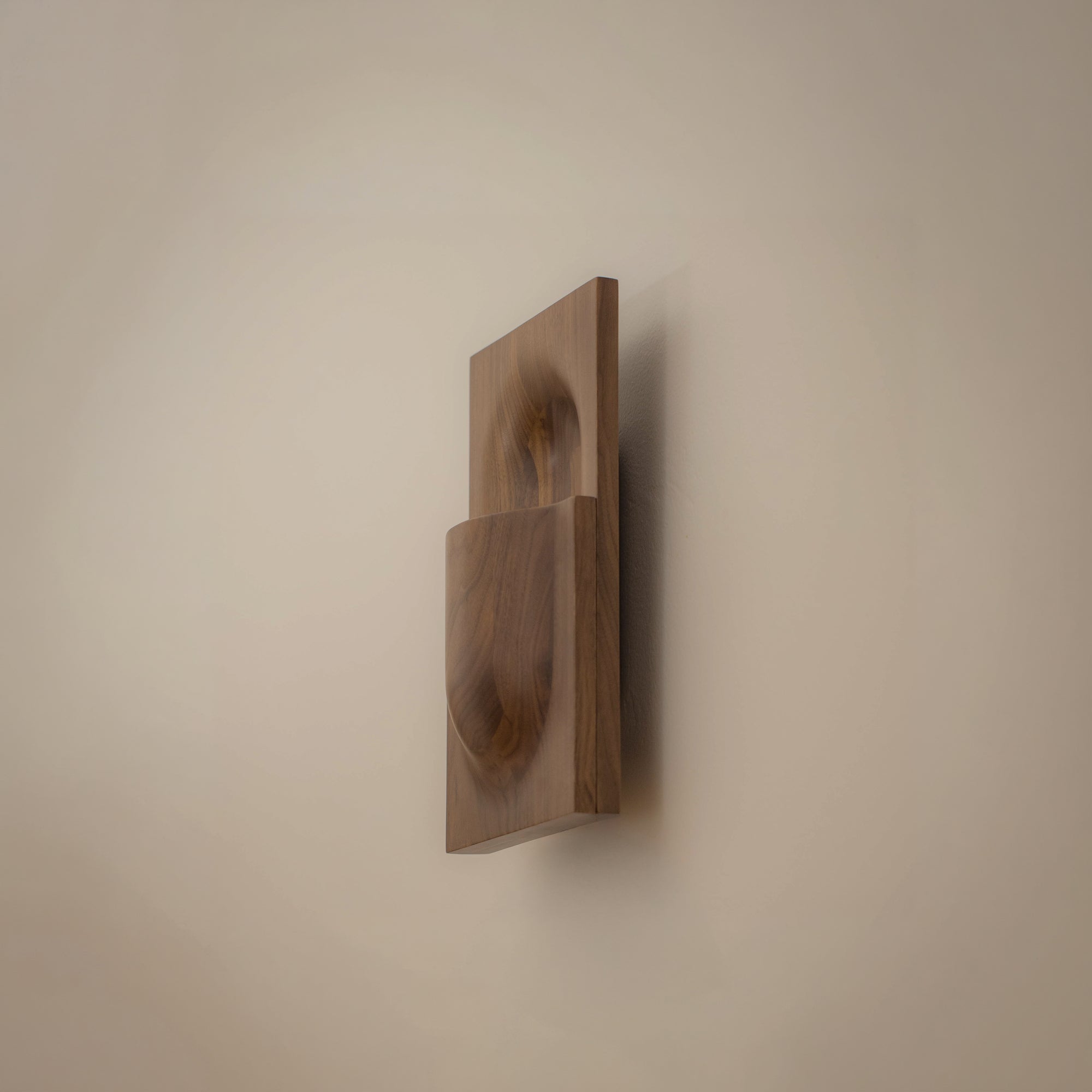 PARCTA Circuit sconce wall light mounted on a wall with a sleek, modern design and minimalist metal finish.